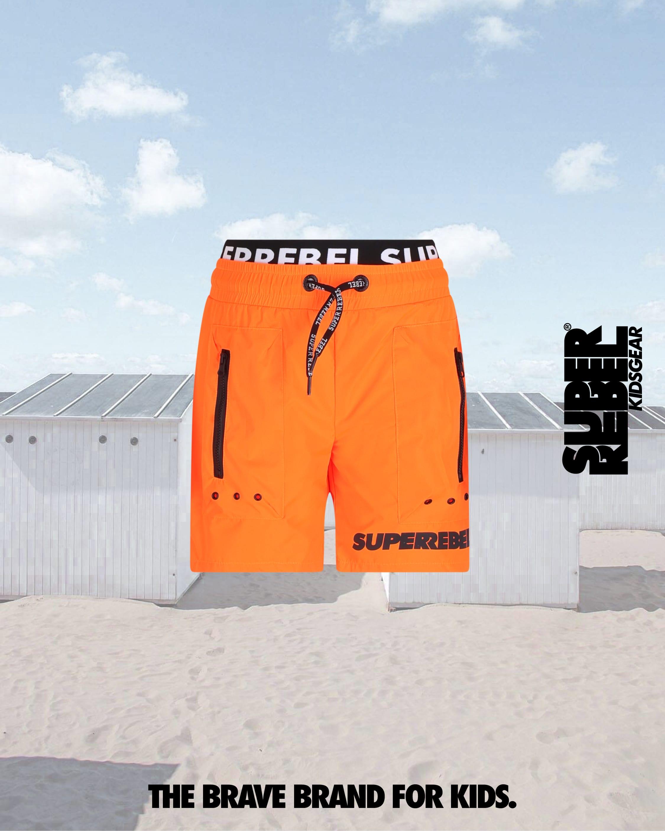 Pantaloni scurți băieți Vulcano portocaliu neon cu buzunare cu fermoar, impermeabili și talie ajustabilă